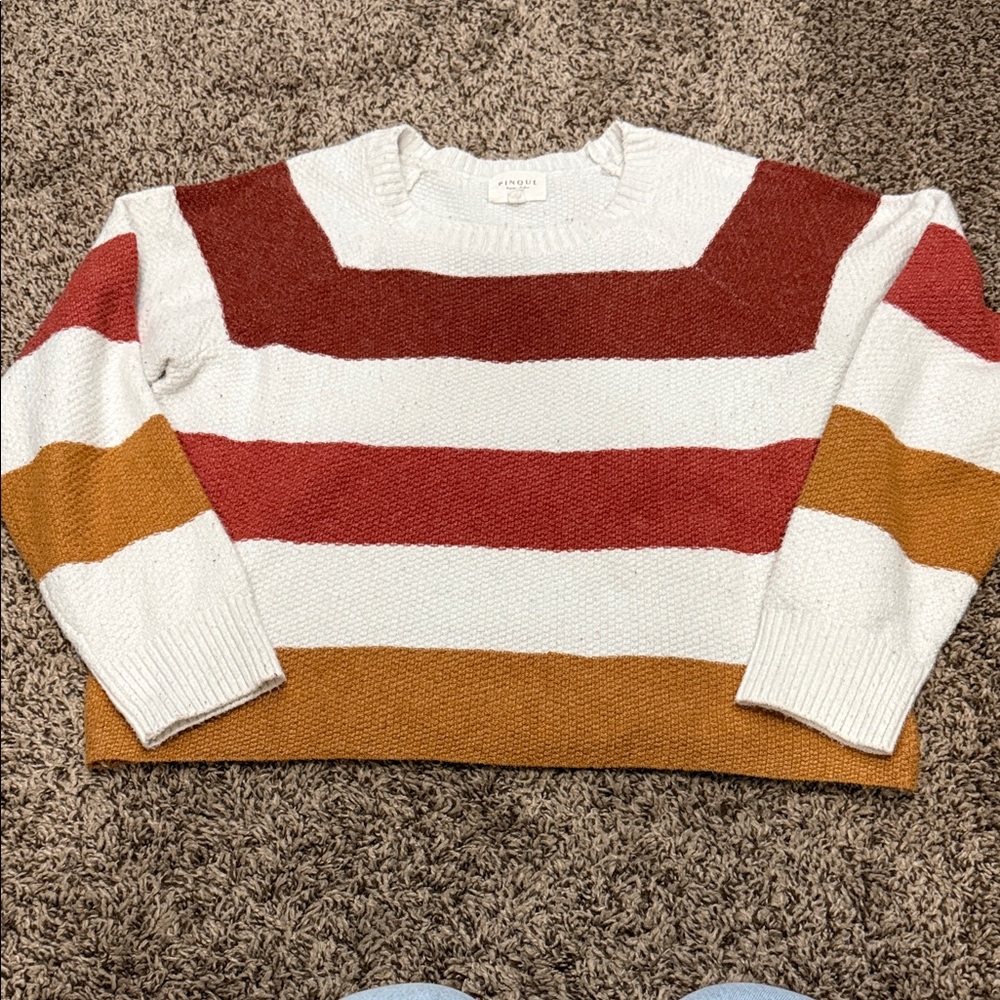 Colorful Striped Sweater in Red, White, and Orange